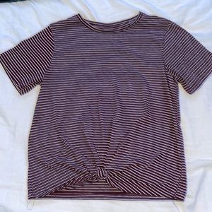 A maroon and white striped shirt with a tie at the bottom. Worn twice